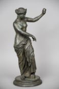 After the Antique, a Grand Tour patinated bronze figure
Modelled as a crowned semi-nude female,