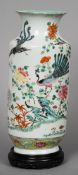 A 19th century Chinese famille rose vase
The white ground decorated with ducks and pheasants amongst