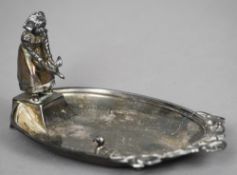 A late 19th/early 20th century WMF pin tray
Formed as a young girl releasing a duckling into a pond.