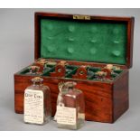 A 19th century mahogany tincture box
The rectangular hinged top with recessed carrying handle