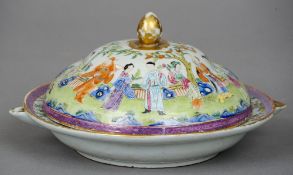 A 19th century Canton polychrome decorated warming plate and cover
Each piece decorated with figures