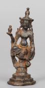 An 18th century Chinese bronze figure of a dancer 
Together with an antique Chinese cast iron