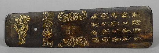 A Chinese bronzed metal spatula
Gilt decorated with figures, bats and archaic calligraphic script