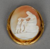 A Victorian yellow metal framed cameo brooch
Worked with St. Francis, the frame tests as 15 ct.  5