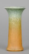 A Ruskin pottery vase
With flared rim and crystalline glaze, impressed mark Ruskin, England, date