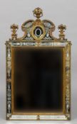 An 19th century gilt brass mounted wall glass
The bevelled plate in an engraved mirror glass frame