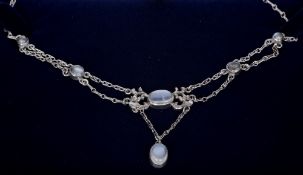 An Arts & Crafts moonstone set silver necklace
39 cm long.