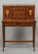 A late Victorian/early Edwardian marquetry inlaid mahogany bonheur du jour
76.5 cm wide. CONDITION