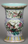 A 19th century Cantonese famille rose vase
With large flared  neck rim above the main bulbous body