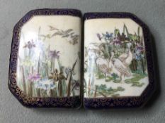 A late 19th century Satsuma porcelain buckle Decorated with storks amongst lily pads. CONDITION