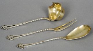 Three pieces of Arts & Crafts 800 silver flatware
Including a twin tined fork, a spoon and a ladle.