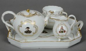 A late 19th/early 20th century tea for one set Including: a tray, a bullet teapot, milk jug, a cup