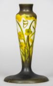 An early 20th century Daum cameo glass lamp base
Of slender vase form with organic decoration,