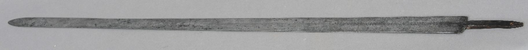 A 17th century broad sword blade
With a Latin inscription translating to "Draw me not without cause,