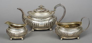 A George III silver three piece tea set, hallmarked London 1817,