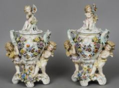 A pair of late 19th/early 20th century Sitzendorf porcelain vases and covers
Each floral encrusted