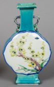 A 19th century Chinese porcelain flask shaped vase
Finely modelled and decorated with floral