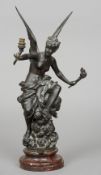 A bronze figural lamp
Formed as an angel, the marble base with label inscribed Reviel du Printemps.