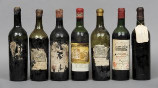 Seven various bottles of red wine
Comprising: Chateau Mouton Rothschild Grand Vin, unknown