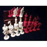A 19th century carved and stained bone chess set
Housed in a mahogany box with a sliding lid. The