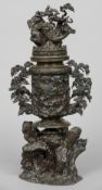 A Japanese bronze censor and cover
In three sections, the pierced cover cast with a serpent