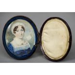 An early 19th century portrait miniature on ivory
Depicting a middle aged woman wearing a lace cap