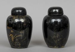 Two Chinese famille noir jars and covers
Each of ovoid form with a removable cover and with gilt