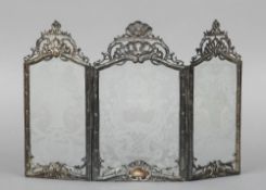 A white metal framed three fold table screen, indistinct hallmarks and stamped Germany
Each glass