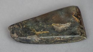 A 19th century Maori green stone adze (Toki Pounamu)
Of typical form.  8 cm long. CONDITION REPORTS: