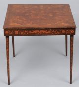 A 19th century Dutch floral marquetry inlaid mahogany card table
The moulded square form with an