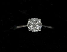 An 18 ct white gold diamond solitaire ring
The claw set stone approximately 0.75 carat. CONDITION