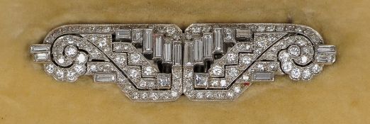 An Art Deco diamond set unmarked white metal clip brooch
Of geometric design in two parts, on