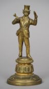 A Victorian brass counter cigar lighter
Formed as Uncle Sam, standing on a stepped spreading