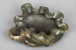 A Chinese carved spinach jade brush washer
Worked as a flowering fruit.  9 cms wide. CONDITION