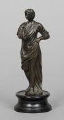 A small 17th century bronze figure
Modelled as a female in flowing robes, on ebonised plinth