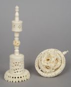 A Chinese Canton carved ivory puzzle ball and stand
Typically intricately carved.  30.5 cm high.