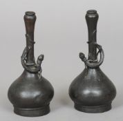 A pair of 17th/18th century Chinese bronze bottle vases
Each with onion neck and applied salamander.