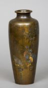 A Japanese inlaid bronze vase
Decorated with a family of chickens.  21 cm high. CONDITION REPORTS: