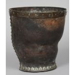 An 18th century leather bucket
Of typical form, undecorated.  26 cm high. CONDITION REPORTS: