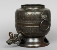 A Chinese bronze samovar
The spout modelled as a dragon's head.  24 cm high. CONDITION REPORTS: