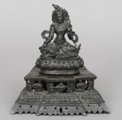 An antique Sino-Tibetan bronze model of Buddha
Modelled seated in the lotus position with