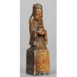 A Chinese carved soapstone seal
Surmounted with the figure of a scholar.  10 cm high. CONDITION