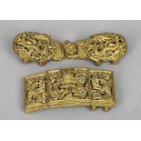 Two 19th century Chinese gilt metal dragon buckles
Both worked with pierced and articulated dragons,