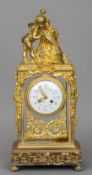 An ormolu mounted gilt brass cased four glass regulator mantel clock
The white painted dial signed