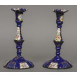 A pair of 18th century Staffordshire enamel candlesticks
Of silver shape decorated with floral