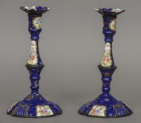 A pair of 18th century Staffordshire enamel candlesticks
Of silver shape decorated with floral