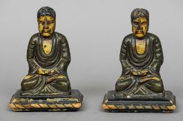 A pair of antique polychrome painted carved wooden models of Buddha
Each typically modelled seated