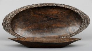 Two carved Samoan bowls
Each of navette form with scroll carved borders.  The larger 71.5 cm