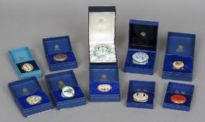 Nine Halcyon Days enamel boxes and a Halcyon Days enamel bonbonniere
Variously decorated, all in