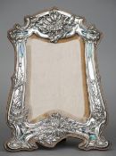 An Edward VII enamel decorated silver photograph frame, hallmarked Birmingham 1904, maker's mark